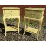 A pair of contemporary lacquered bedside tables each having two small drawers over open shelves to