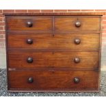 A 19th Century mahogany straight front chest of two short over three long graduated drawers with