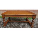 A large 20th Century period-style oak coffee table.