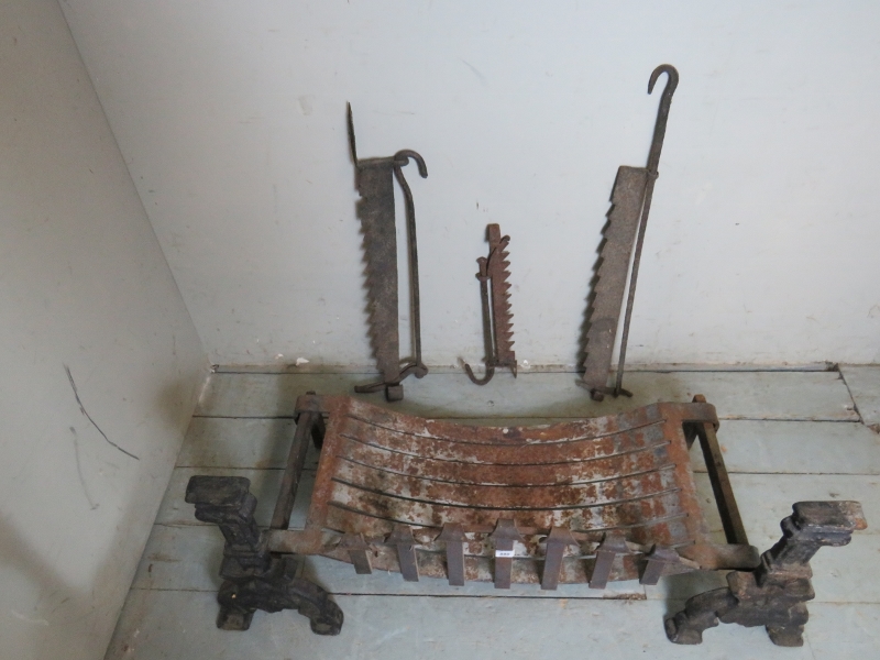 A cast iron fire basket raised on a pair of fire dogs together with three iron pot hooks / fire - Image 3 of 4