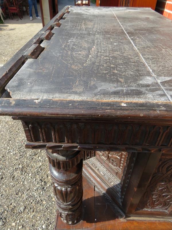 A large part 16th Century carved oak court cupboard with a central cupboard door flanked either - Image 10 of 11