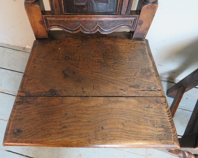 A pair of 17th Century oak hall chairs with carved motifs and spiral twist uprights and lower front - Image 5 of 8