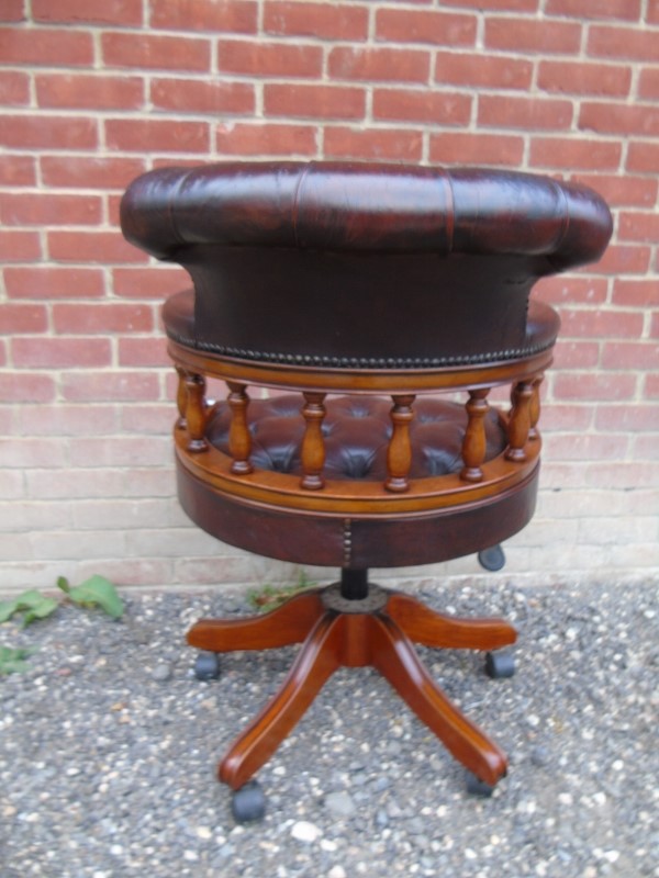 A good quality 20th Century captains swivel and tilting desk chair upholstered in a buttoned - Image 2 of 3