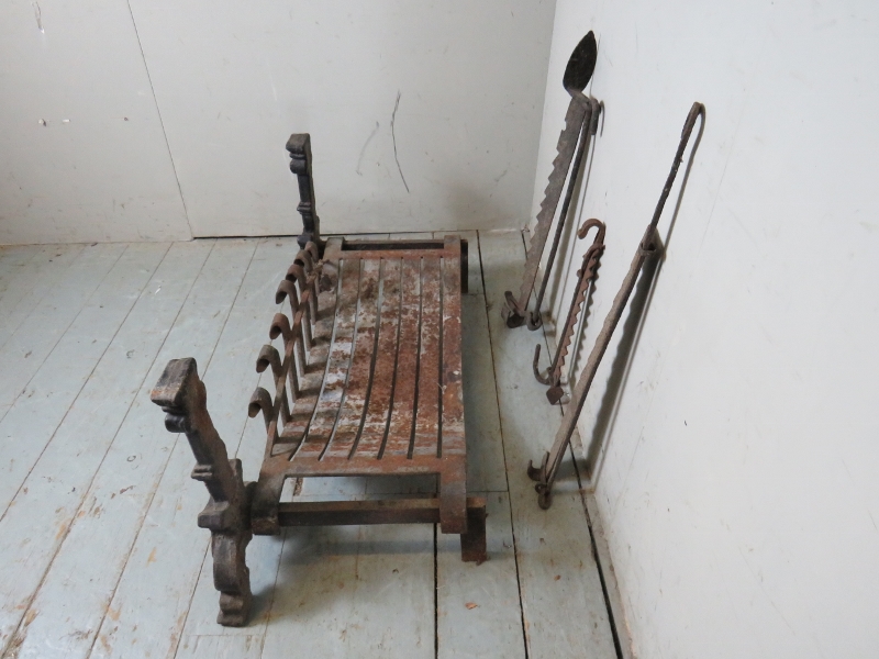 A cast iron fire basket raised on a pair of fire dogs together with three iron pot hooks / fire - Image 4 of 4
