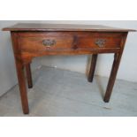 An 18th century country oak side table with two drawers. Condition report: Good overall condition.