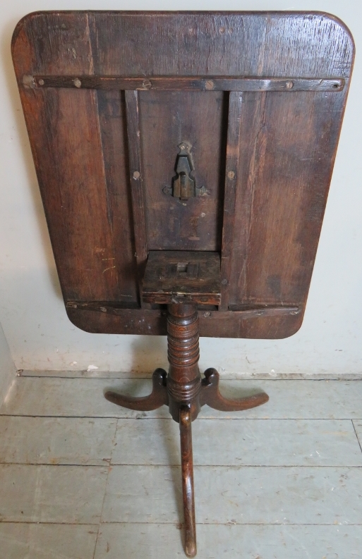 A 19th Century oak rectangular tilt top tripod table. Condition report: Good solid table. - Image 4 of 4