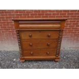 A Victorian pale mahogany Scotch chest of drawers with a long blind drawer to top over two small