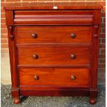 A Victorian Scotch chest having a long blind drawer to top over three further long drawers with