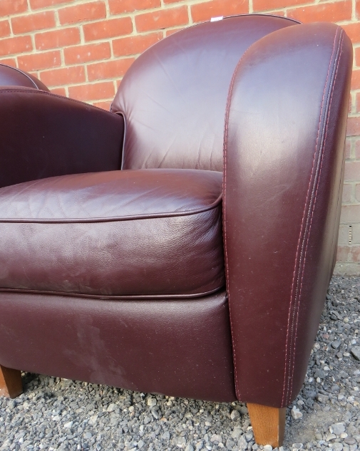 A pair of contemporary tub chairs upholstered in a deep brown / aubergine leather. - Image 2 of 8
