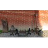 Assortment of vintage items to include: Fire basket and dogs, rainwater hopper,