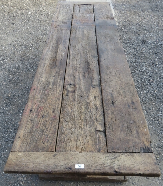 An early rustic three plank refectory dining / kitchen table with a centre lower stretcher bearing - Image 3 of 5