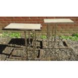 A pair of contemporary chrome side tables with inset wood panels to tops.