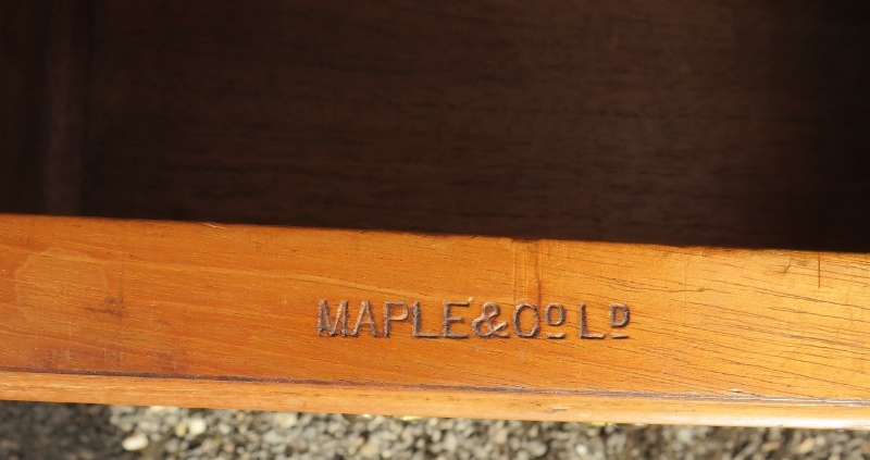 A 19th Century walnut chest of four drawers beneath a quarter veneered top with decorative moulding - Image 2 of 3