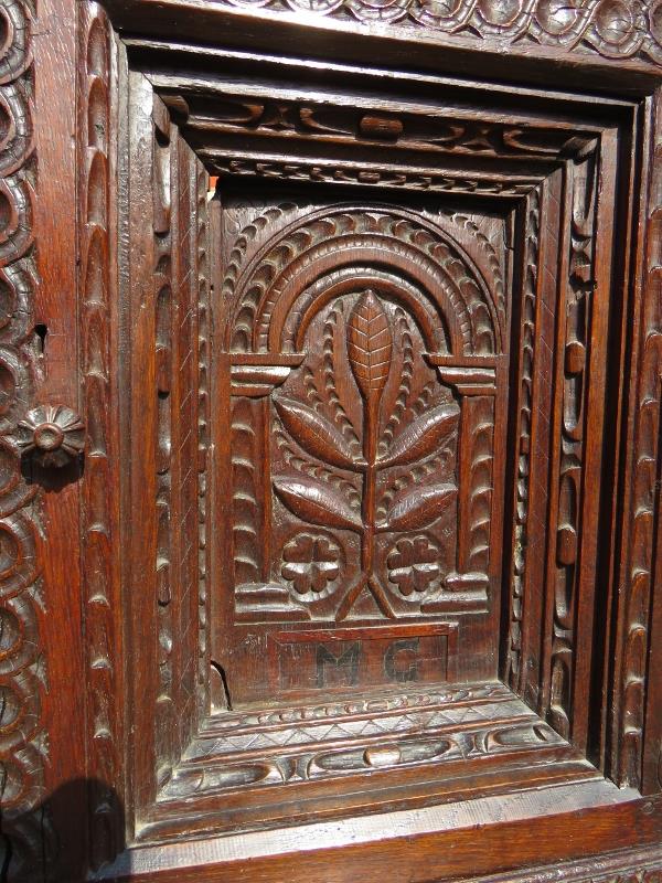 A large part 16th Century carved oak court cupboard with a central cupboard door flanked either - Image 3 of 11