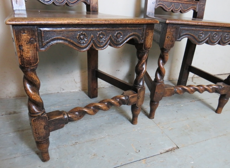 A pair of 17th Century oak hall chairs with carved motifs and spiral twist uprights and lower front - Image 4 of 8