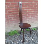 A 19th Century oak high back spinning chair. Condition report: Some losses around feet. 103cm high.