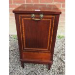 An Edwardian mahogany cross banded purdonium coal box with a fall front revealing an internal liner.