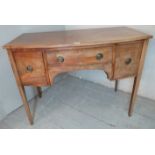 A small 19th century mahogany bow fronted sideboard with a central drawer flanked either side by