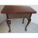 A Georgian mahogany turn over tea table on cabriole legs. Condition report: Has discolouration.