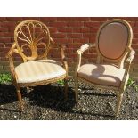 A 20th Century gilt framed elbow chair with a carved wheatsheaf design to back splat over a cream