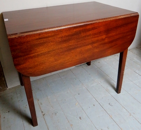 A 19th century mahogany drop leaf Pembroke table with a single drawer to one end having brass