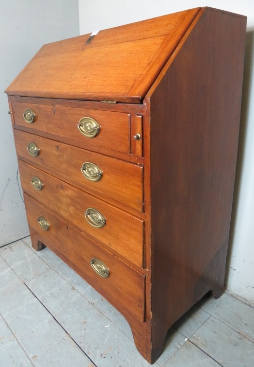 A George III pale mahogany bureau with a fall front flap opening to reveal a fitted interior over - Image 2 of 6