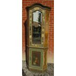 A decorative 19th Century tall painted display cabinet with a mirrored cupboard door to top