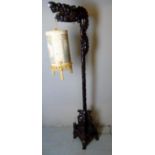 A fine early 20th Century carved hardwood dragon freestanding standard lamp complete with original