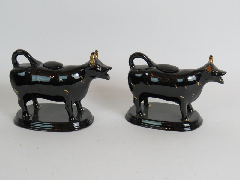 A pair of antique black glazed cow cream - Image 2 of 6