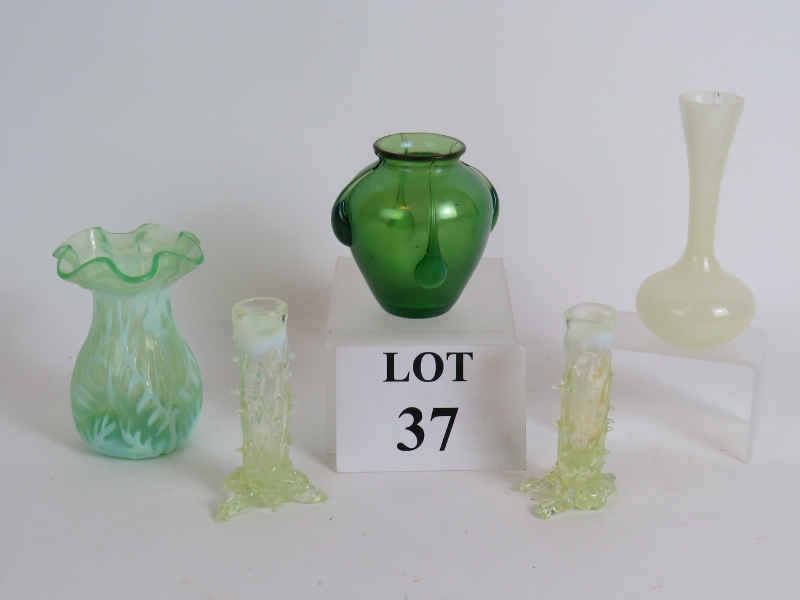 A small green Loetz style teardrop glass