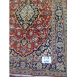 A Persian rug with central pattern on r