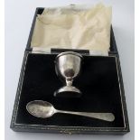 A cased silver egg cup and spoon, Birmin