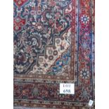 A Hamadan rug with central motif on blue