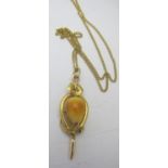 A 14/15ct yellow gold tested pendant, on