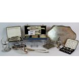 A selection of good quality silver plated items including a galleried tray, toast racks, jam pot,