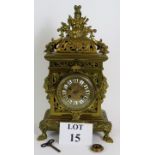 An ornate French brass mantle clock by J Marti & Co (c1880),