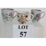 Three Late 18th Century porcelain cups, each hand decorated with floral motifs, probably English.
