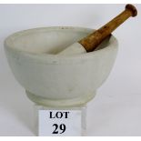 A large vintage pharmacy pestle and mortar. Porcelain with a Hardwood handle. Diameter 28cm.