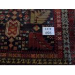 An Azarabaijan rug, 305cm x 110cm approx. Condition report: Good condition, even colour.