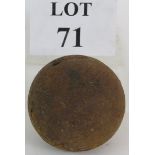 A cast iron 4" cannon ball. Condition report: Overall rust and corrosion. Estimated: £20-£40.