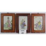 Three early 20th Century Japanese porcelain panels each hand painted with folklore scenes and