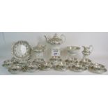 A highly ornate antique pearl ware tea set with intricate gilt decoration.