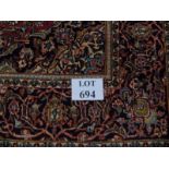 A Kashan rug, 205cm x 140cm, approx. Condition report: Good clean rug, even colour.