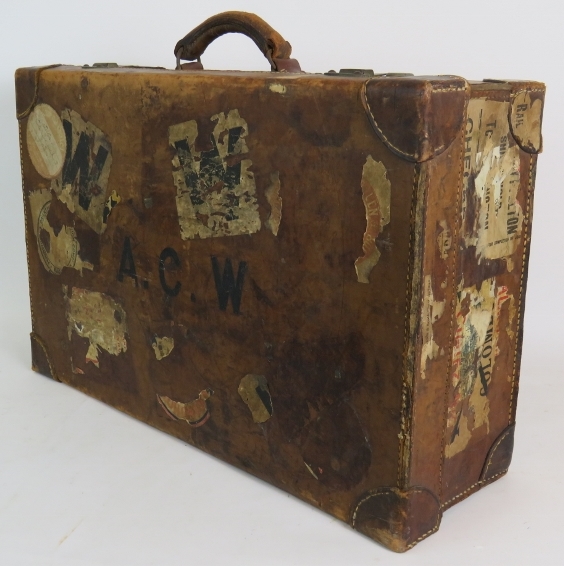 A good quality antique leather suitcase with many travel labels attached, 62cm x 39cm, - Bild 2 aus 4