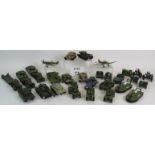 A collection of vintage Dinky, Britains and Crescent Military vehicles, guns and planes.