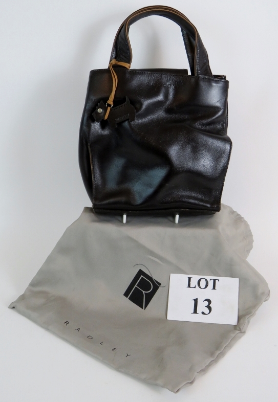 A small black leather Radley handbag with contrasting leather trim and original dust bag.