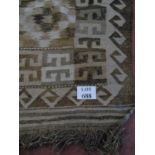 A 20th century Persian village rug on fawn ground, 190cm x 100cm approx.