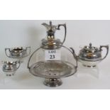 An ornate Victorian four piece silver plated tea set by James Deacon & Sons and a similar plated