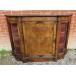 A Victorian marquetry inlaid and ormolu mounted figured walnut shaped front credenza,