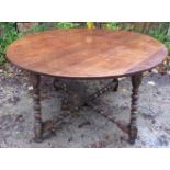 A well made 17th century style oak circular table of later construction,